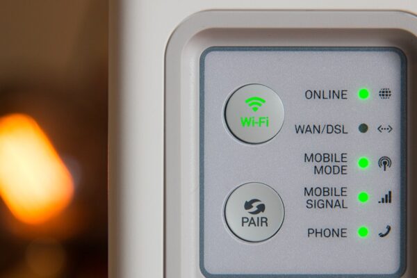 Close-up of a home router that keeps restarting