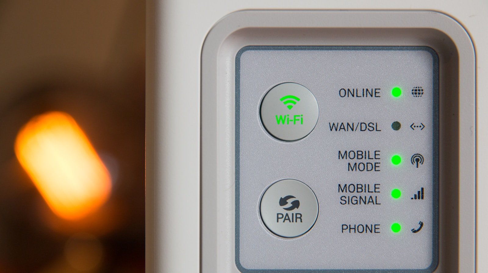 Close-up of wireless router status lights during WiFi troubleshooting