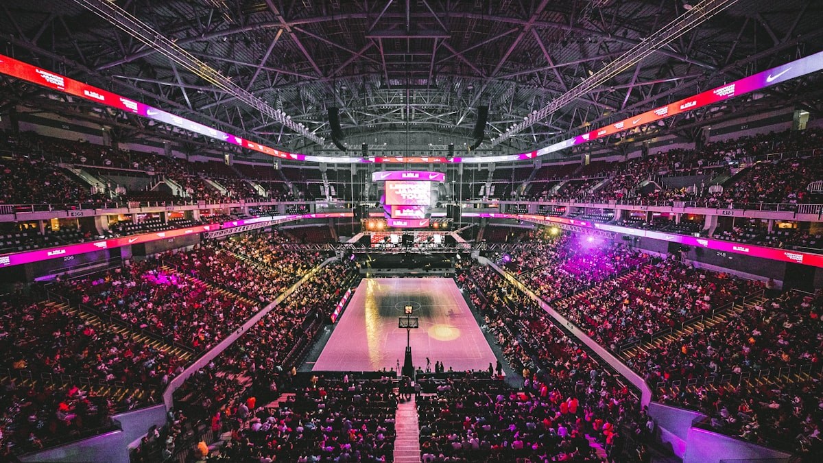 NBA basketball arena spotlight on the hardwood court before tipoff