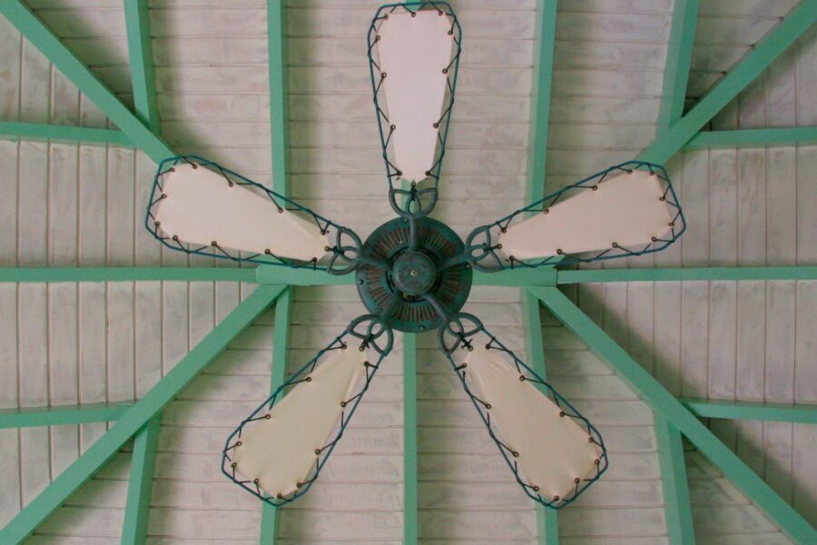 Five-blade ceiling fan viewed from below — ceiling fan wobble fix guide