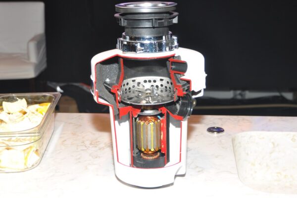 Resetting a garbage disposal with a hex wrench