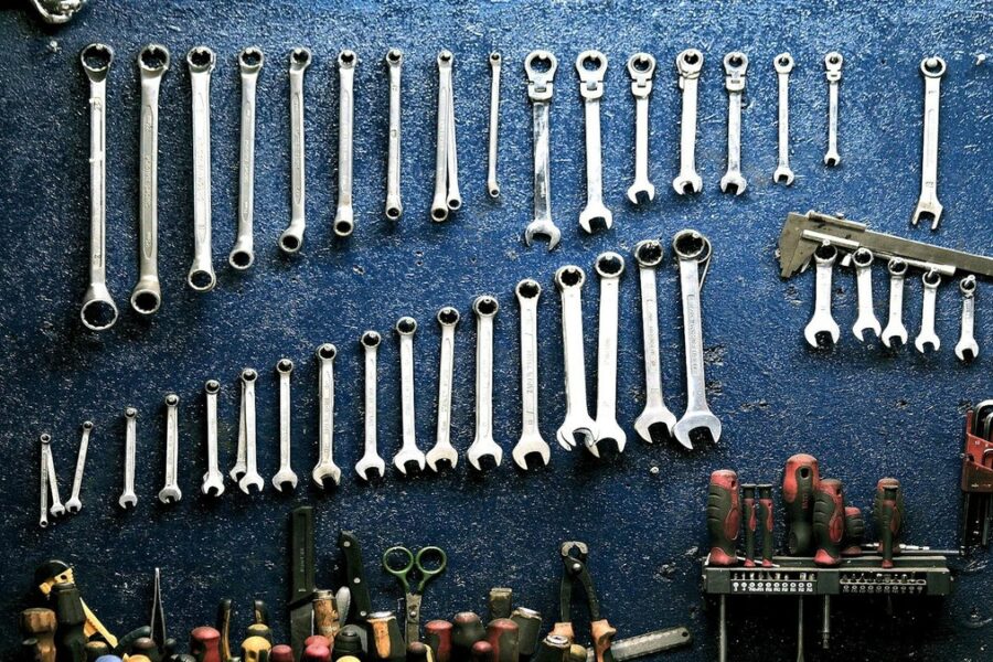 Water heater repair tools laid out for a temperature fix